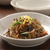 a plate of japchae glass noodles